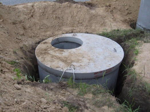 Как сделать выгребную яму из бетонных колец?